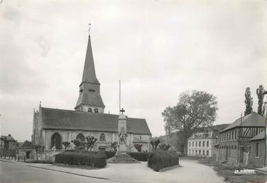 / CPSM FRANCE 76 "Duclair, l'église et le monument aux morts "