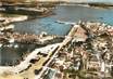 / CPSM FRANCE 29 "Concarneau, vue aérienne, les quais et l'entrée du port"