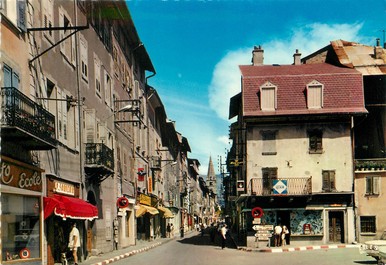 / CPSM FRANCE 04 "Barcelonette, la rue Manuel " / COMMERCE