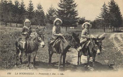 / CPA FRANCE 63 "La Bourboule, promenade à Âne" / ENFANTS