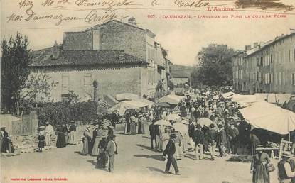 / CPA FRANCE 09 "Daumauzan, l'avenue du pont un jour de foire"