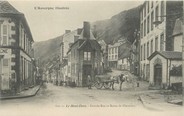 63 Puy De DÔme / CPA FRANCE 63 "Le Mont Dore, grande rue et route de Clermont"