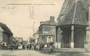 27 Eure CPA FRANCE 27 "La Madeleine de Nonancourt, grande rue et porche de l'Eglise"