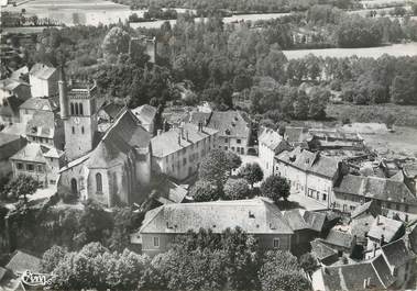 / CPSM FRANCE 38 "Morestel, vue aérienne, l'église et son quartier"