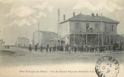 / CPA FRANCE 13 "Port Saint Louis du Rhône, vue du Grand magasin Général et l'Eglise"