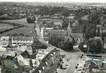 / CPSM FRANCE 50 "Saint Denis Le Gast, vue aérienne sur l'église"