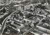 / CPSM FRANCE 54 "Toul, vue aérienne, écoles Moselly et place de la République"