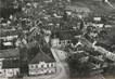 / CPSM FRANCE 58 "Saint Saulge, vue aérienne sur l'hôtel de ville et l'église"