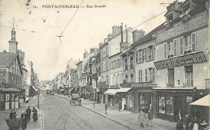 CPA FRANCE 77 "Fontainebleau, la rue Grande, magasin de la carte postale illustrée" / Editeur DE CARTE POSTALE ELD