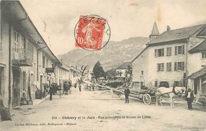 CPA FRANCE 01 "Chèzery et le Jura, rue principale et route de Lèlex"