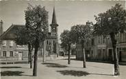 03 Allier CPSM FRANCE 03 "Neuilly le Real, Places de la Mairie et de l'Eglise"