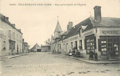 / CPA FRANCE 18 "Villeneuve sur Cher, rue principale et l'église"