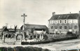 / CPSM FRANCE 50 "Guilberville, le monument et l'école de garçons"