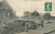 59 Nord / CPA FRANCE 59 "Douchy, le pont et la route de Cambrai"