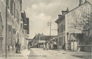 01 Ain / CPA FRANCE 01 "Divonne Les Bains, rue principale et postes"