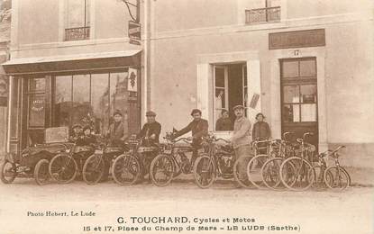 CPA FRANCE 72 "Le Lude, Cycles et Motos G.Touchard, Place du Champ de Mars"