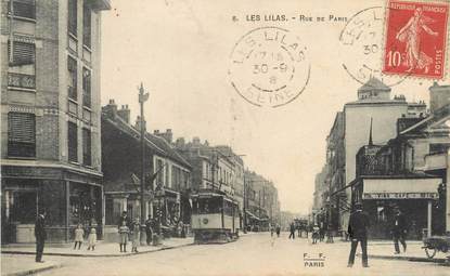 / CPA FRANCE 93 "Les Lilas, rue de Paris" / TRAMWAY