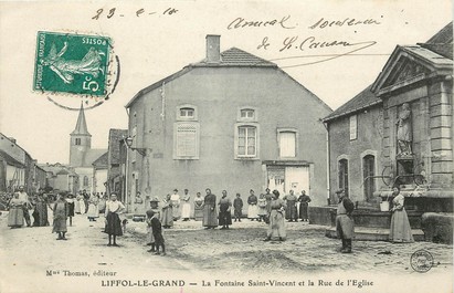 CPA FRANCE 88 "Liffol le Grand, La Fontaine Saint Vincent et la rue de l'Eglise"