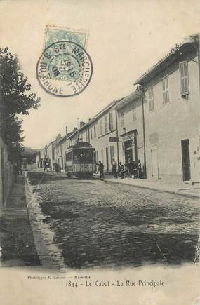 / CPA FRANCE 13 "Le cabot, rue principale" / TRAMWAY
