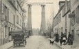 CPA FRANCE 94  "Villeneuve Saint Georges, entrée du Pont, Epicerie, Pr. QUENOT"