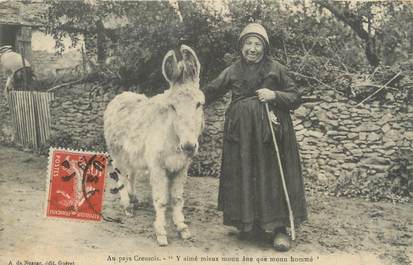 / CPA FRANCE 23 "Au pays Creusois"  / FOLKLORE / VIEILLE FEMME / ÂNE