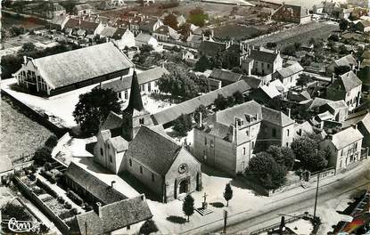 CPSM FRANCE 58 "Dornes, vue aérienne sur les Ecoles, l'Eglise et le Marché"