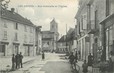 / CPA FRANCE 38 "Les Abrets, rue Gambetta et l'église"