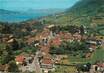 / CPSM FRANCE 74 "Menthon Saint Bernard, vue aérienne sur le village et le lac"