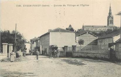 / CPA FRANCE 38 "Eyzin Pinet, entrée du village et l'église"