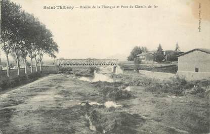 .CPA   FRANCE 34  "St Thibéry, Rivière de la Thongue et pont du chemin de fer'