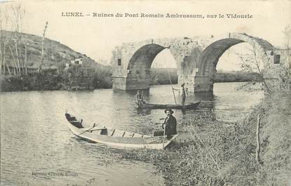 .CPA  FRANCE 34 " Lunel, Rue du pont Romain Ambrunssum sur le Vidourie"