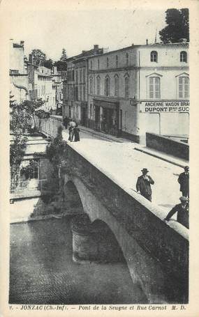 .CPA  FRANCE 17 " Jonzac, Pont de la Seyne et rue Carnot"