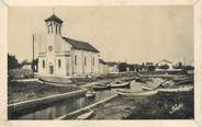 34 Herault . CPA FRANCE 34 "Le Grau d'Agde, L'église et le canal"