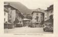 .CPA  FRANCE 74 " Taninges, La place et la chapelle Ste Anne"