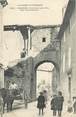 26 DrÔme .CPA FRANCE 26 "Donzère, Une porte de la ville dans la grande rue"