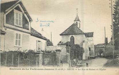 .CPA  FRANCE 77 "Reuil, La rue de Rohan et l'église"