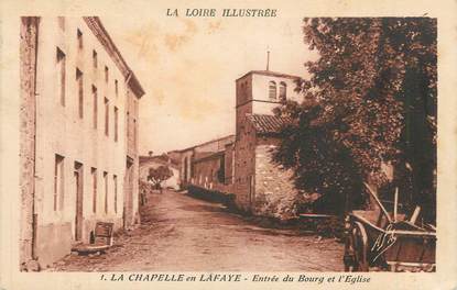 .CPA FRANCE 42 "La Chapelle en Lafaye, Entrée du bourg et l'église"