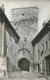 42 Loire .CPSM  FRANCE 42  "Usson en Forez, Ruelle et tour d'enceinte"