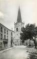 42 Loire .CPSM  FRANCE 42  "Usson en Forez, L'église, porte principale"