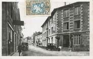 42 Loire .CPSM  FRANCE 42  "Usson en Forez, Rue centrale, et Grand Hôtel Aubert"