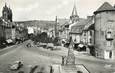 .CPSM  FRANCE 12 "Espalion, Place St Georges et le monument aux morts"