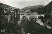 15 Cantal . CPSM  FRANCE 15  "Lanau, Le village et le pont"