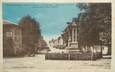 . CPA  FRANCE 69 "Belleville sur Saone, Grande rue, monument aux morts"