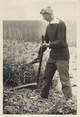 Theme PHOTO ORIGINALE / THEME "Le Faucheur, ouvrier frontalier allemand, 1941"