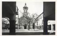 81 Tarn CPSM FRANCE 81 "Réalmont, L'église et un coin des arcades ".