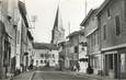 CPSM FRANCE 01 "St Trivier de Courtes, La grande rue et l'église".