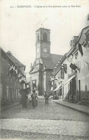 CPA FRANCE 68 "Massevaux, L'église et a rue pavoisée pour la fête dieu".