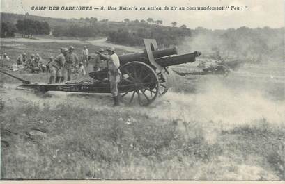 CPA FRANCE 30 " Camp des Garrigues, Une batterie en action de tir au commandement feu".