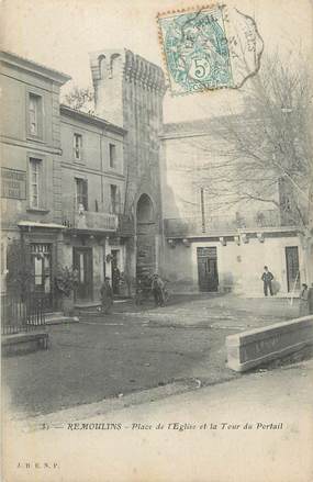 CPA FRANCE 30 " Remoulins, Place de l'église et la tour du portail".