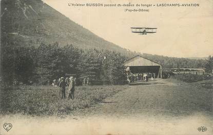 CPA FRANCE 63 " Lascamps Aviation, L'aviateur Buisson passant au-dessus du hangar".